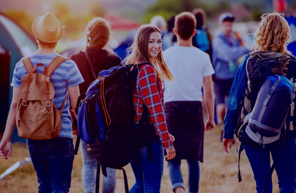 Group of friends safely departing festival grounds 