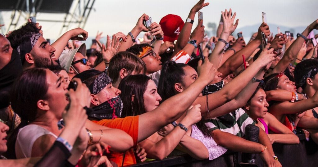 Crowd tightly packed together, illustrating the risks of overcrowding